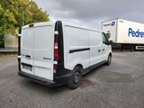 a white van that is parked in a parking lot