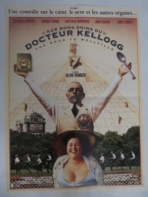 Affiche de film français pour « Le Docteur Rellog », mettant en scène une femme coiffée d'un chapeau et un homme en costume