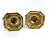 pair of antique brass candlesticks with green glass inserts