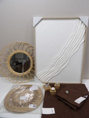 a picture of a table with a picture frame and other items on it