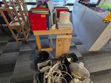 a pile of electronics sitting on the floor in a room