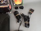 a lot of wires and cords that are on the table