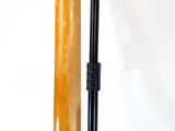 a baseball bat and a ball sitting next to each other