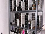 a shelf with a lot of boxes of cigarettes on it