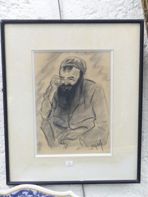 tableau représentant un homme barbu assis devant une coupe de fruits