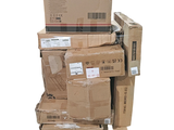 many boxes stacked on top of each other on a pallet