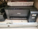 a printer that is sitting on top of a box