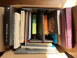 a box full of books sitting on a table