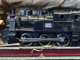 a toy train sitting on top of a cardboard box
