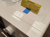 a box that has a lot of items on top of it