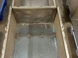 an image of a metal sink with a drain
