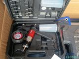 a tool in a case that is sitting on the floor