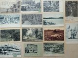 de nombreuses vieilles photos de personnes et de bâtiments accrochées au mur