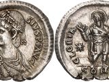 a silver coin with an image of a woman and a man on it