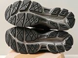 a close up of a pair of shoes on top of a box