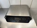 stainless steel counter top with a digital display on it