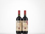 two bottles of red wine sitting on top of a table