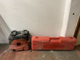 two tools sitting next to each other on the floor
