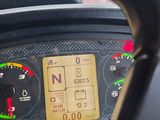 a close up of a car dashboard with a speedometer