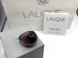 a white bag with a black object in it and a white bag with a black object in it
