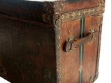 an old trunk that is sitting on a white surface