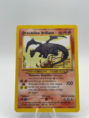 the card is yellow and has a black dragon on it