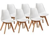 un lot de six chaises blanches à pieds en bois
