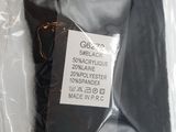 a plastic bag with a black tie on it