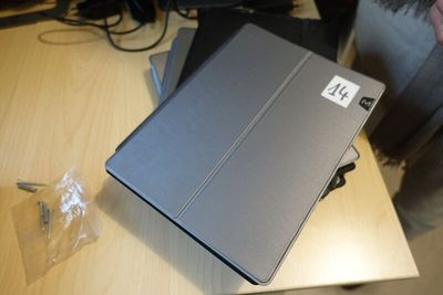 a laptop that is sitting on top of a table