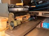 a machine that is sitting on top of a wooden table