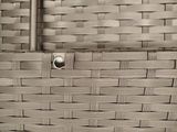 a close up of a basket with a handle on it