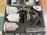 a case with a variety of spray guns and other items in it