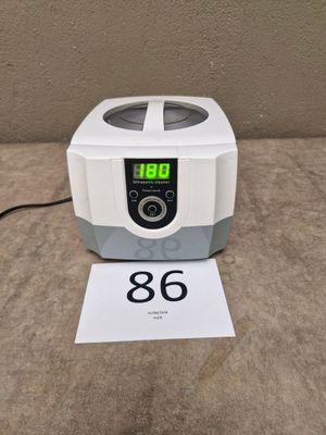 an image of a digital centrifuizer sitting on a table