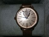a watch that is sitting in a box on a table