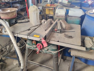 a picture of a workbench in a garage with tools on it