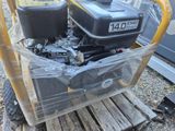 a small engine sitting on a pallet on a pallet