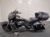 a picture of a motorcycle that is parked on a checkered floor