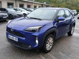 a blue toyota rav parked in a parking lot