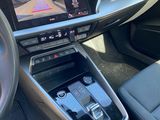the interior of a car with a dash camera and a steering control