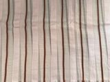a close up of a piece of fabric with stripes on it