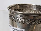 a silver cup that has a label on it