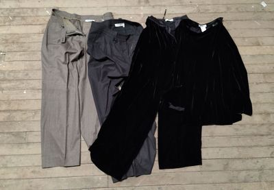 three pieces of clothing that are laying on the floor