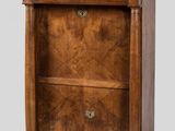an image of a wooden cabinet with two drawers on one side and a shelf on the other side