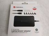 an image of a box containing a laptop power adapter and a charger