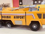a toy fire truck that is sitting on a table