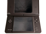 a black nintendo 3ds sitting on a white surface