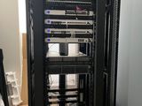 a rack with a bunch of wires on it in a room