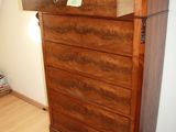 an image of a wooden dresser in a room