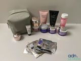 a picture of a variety of skin care products laid out on a table