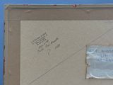 une photo d'un morceau de papier posé sur un morceau de carton